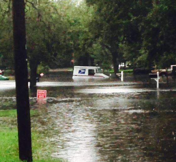 Mail Carrier Rescued as Heavy Rains Cause Flooded Roadways in Florida ...